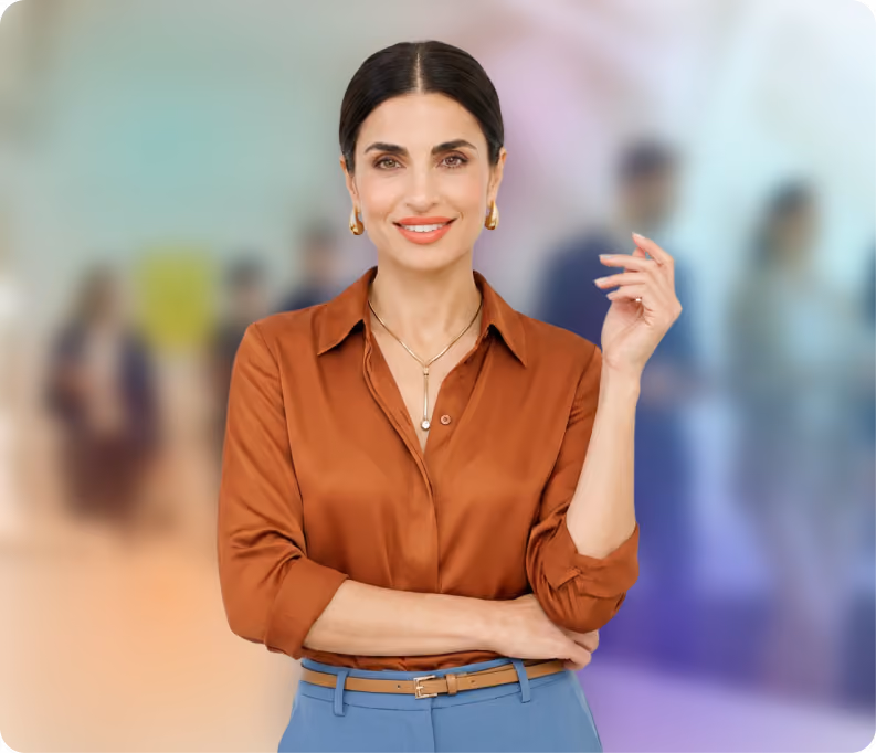 A business woman posing in a modern colorful office