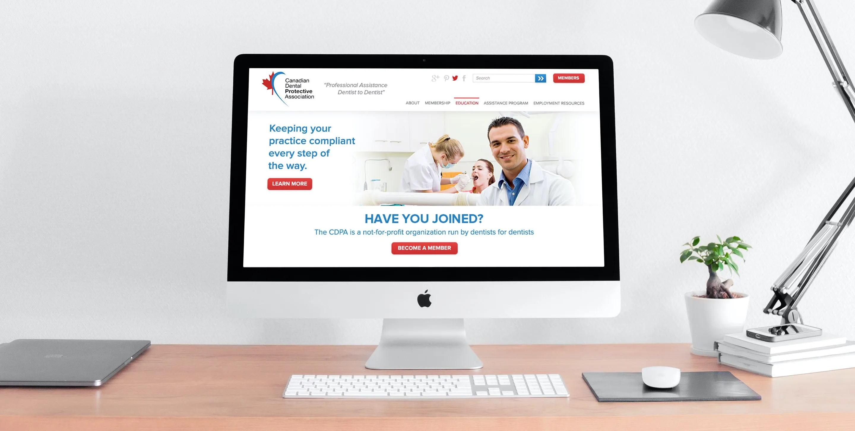 Canadian Dental Protective Association (CDPA) dental website design displaying on an iMac. 加拿大牙科保護協會網站設計顯示在iMac上.