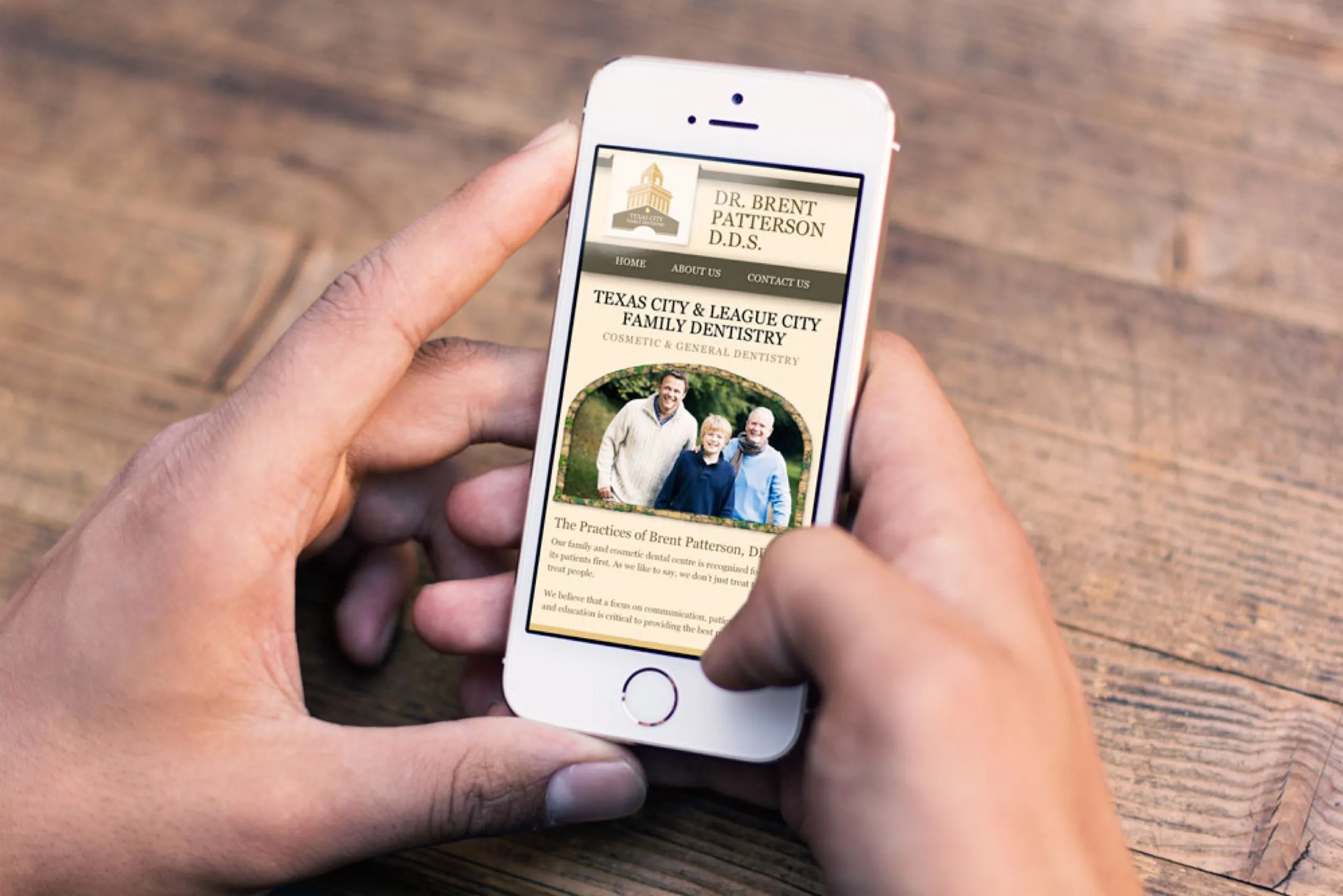 Responsive mobile web design by FAMGO Design, showing an iPhone mockup with a custom conversion-focused dental website interface for Dr. Brent Patterson, optimized for mobile user experience and local client acquisition.
