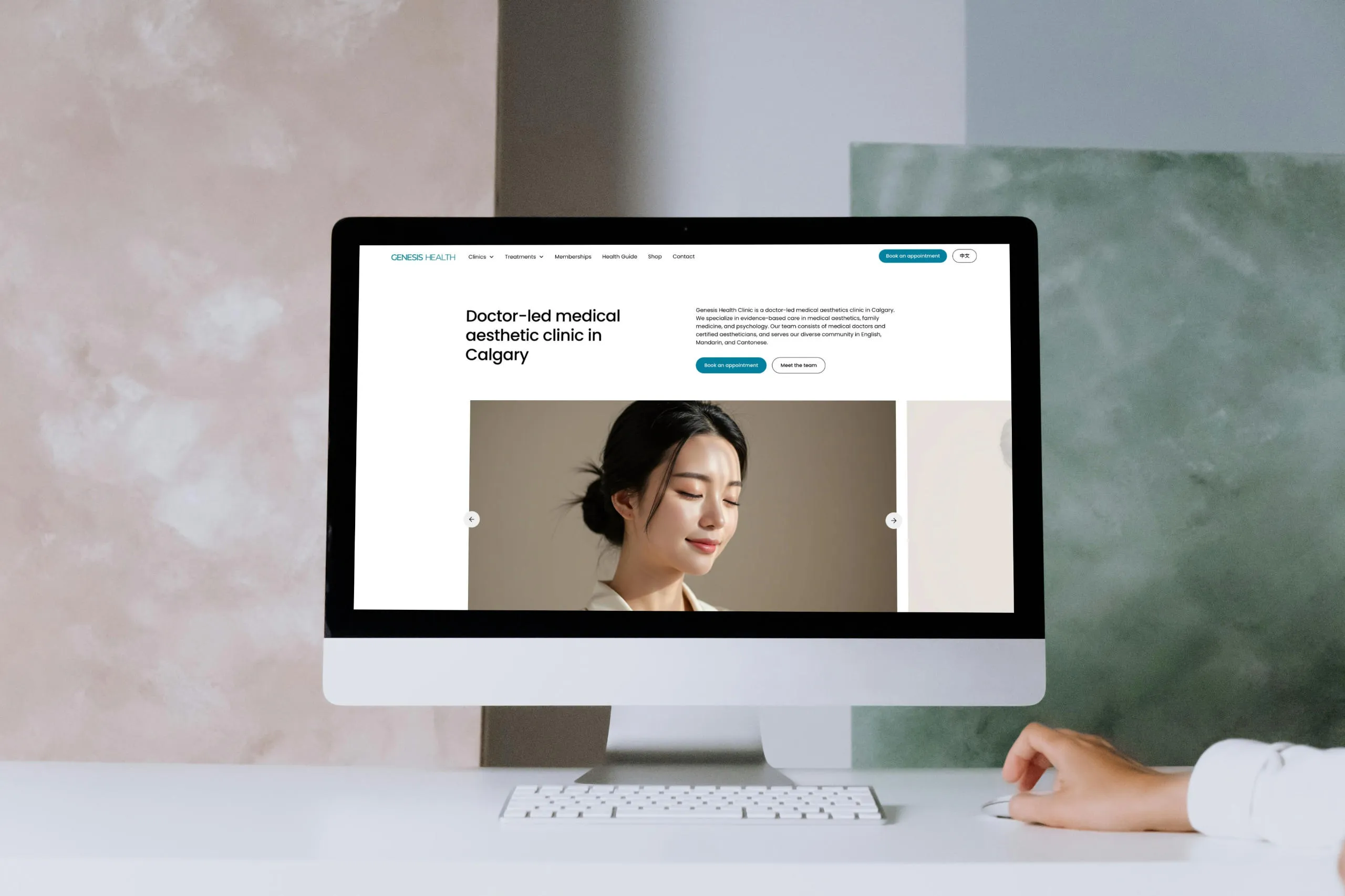 Desktop computer displaying the Genesis Health Clinic homepage featuring a smiling woman and text about doctor-led medical aesthetic clinic in Calgary.