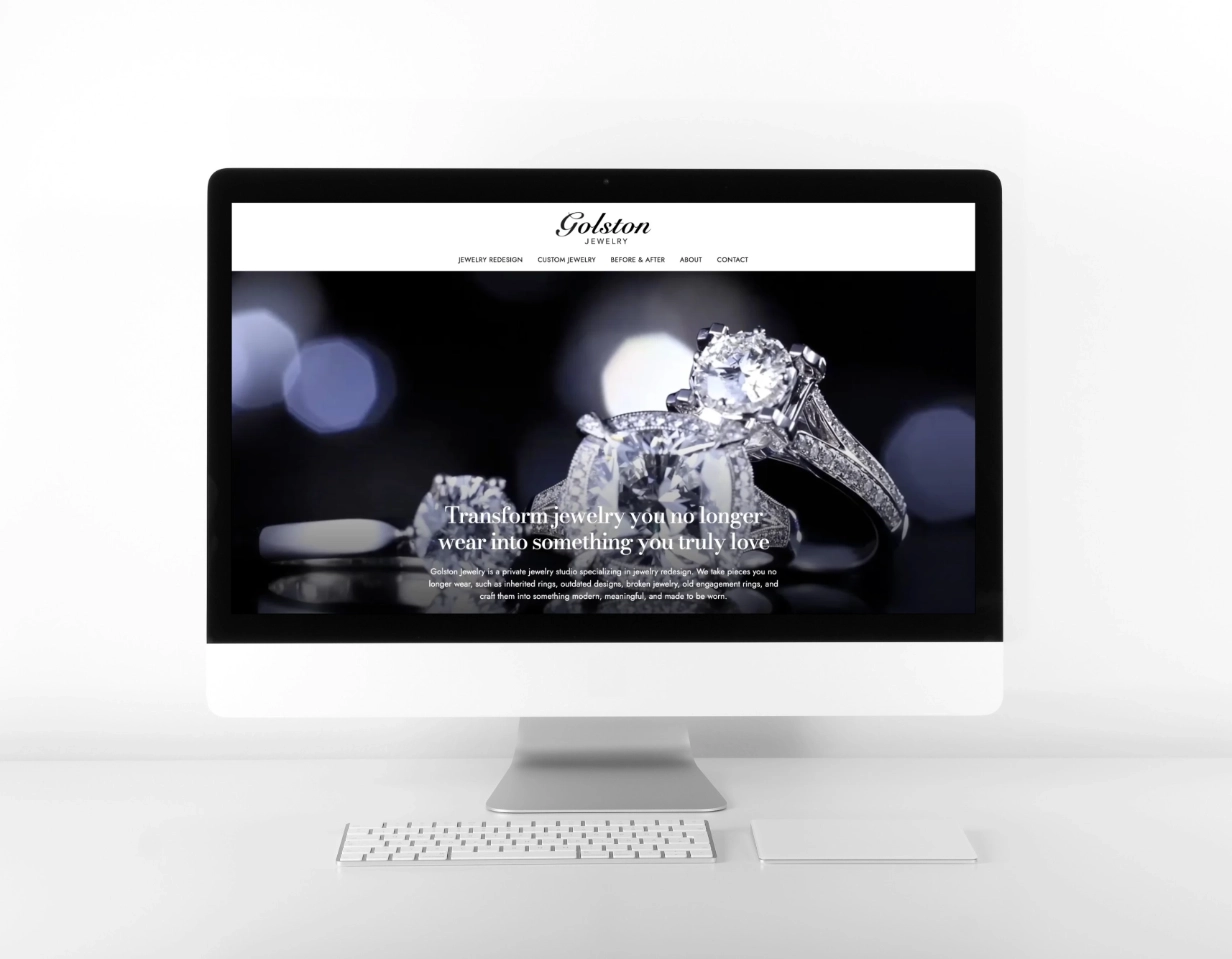 Desktop iMac mockup showcasing FAMGO's luxury website design for the Golston Jewelry homepage, featuring a high-end hero image of diamond rings and conversion-focused value proposition copy.