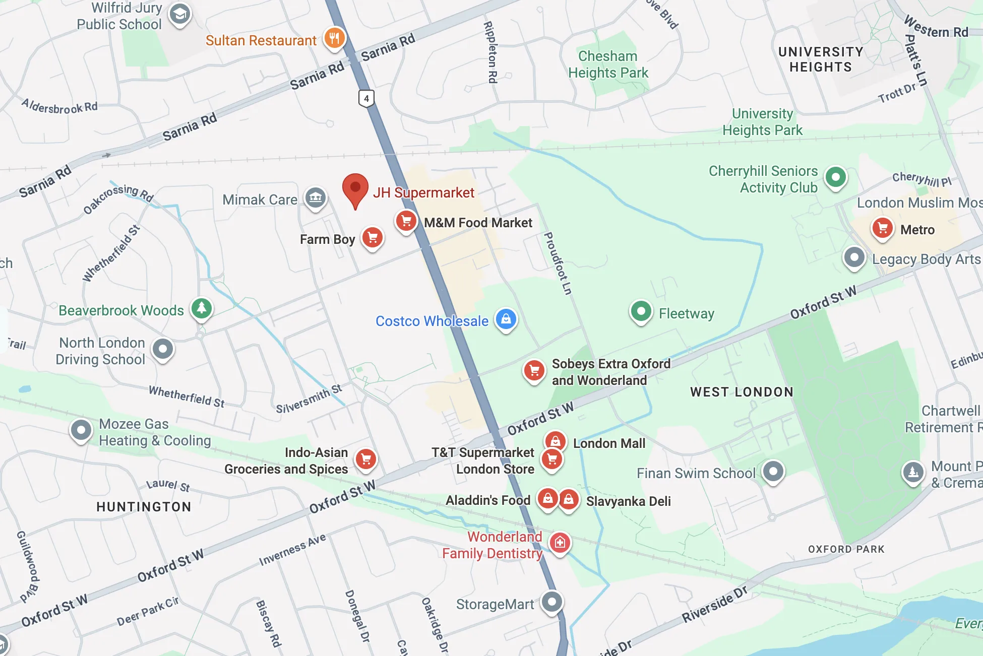 Google Map pins on JH Supermarket while showing many supermarkets around it.