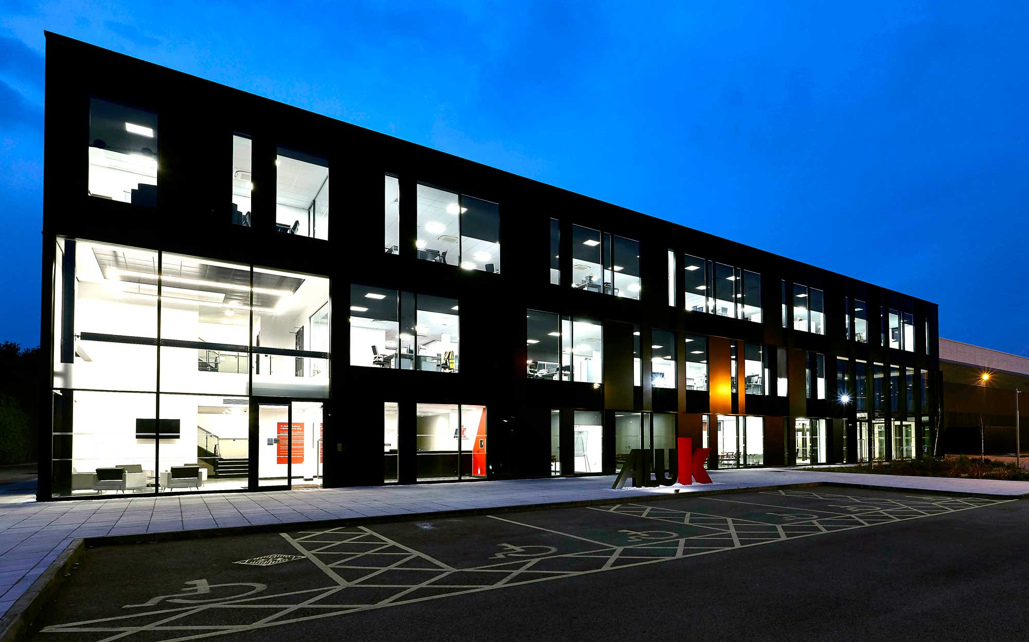 AluK HQ at night