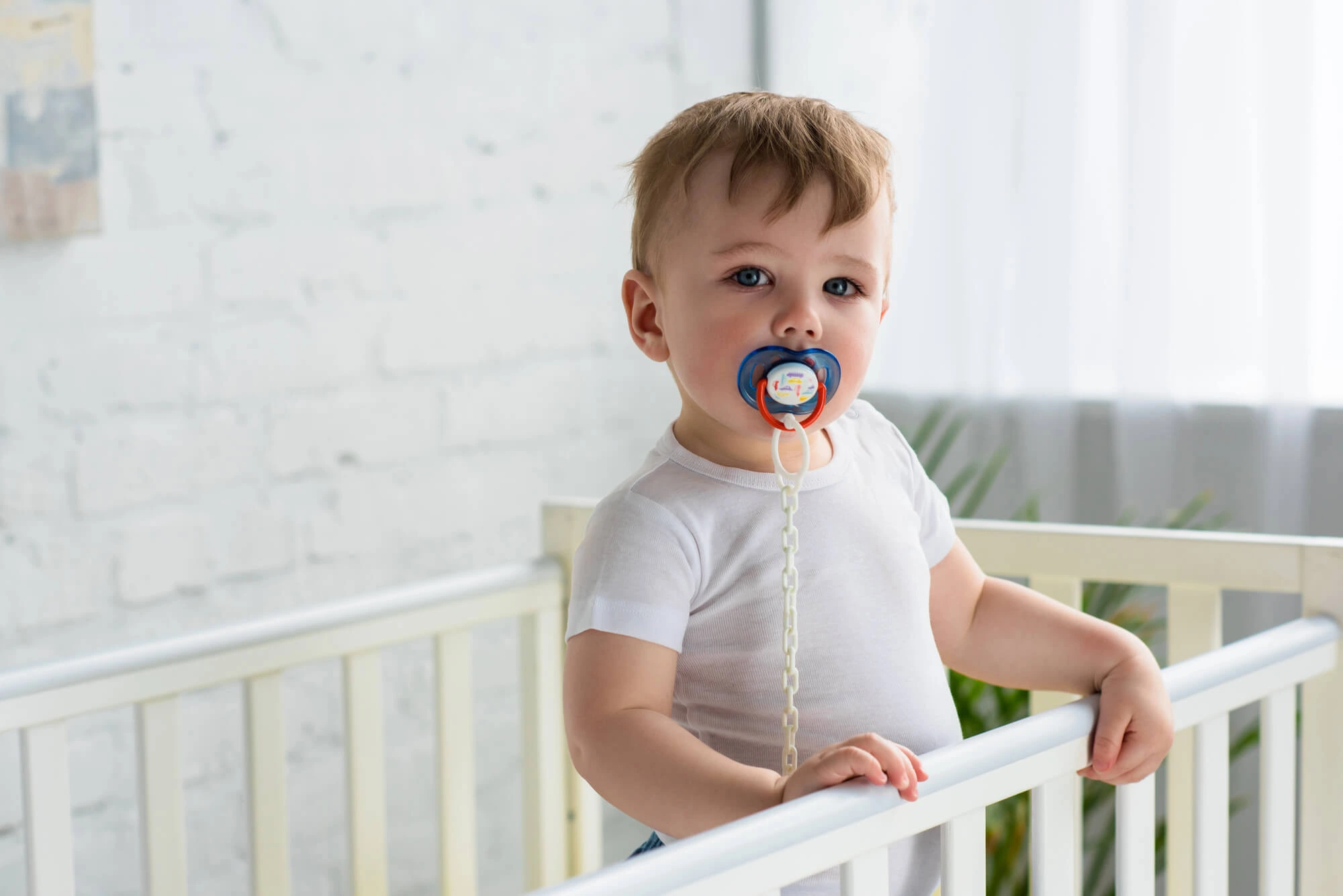 baby using pacifier after visiting the pediatric dentist in hollywood