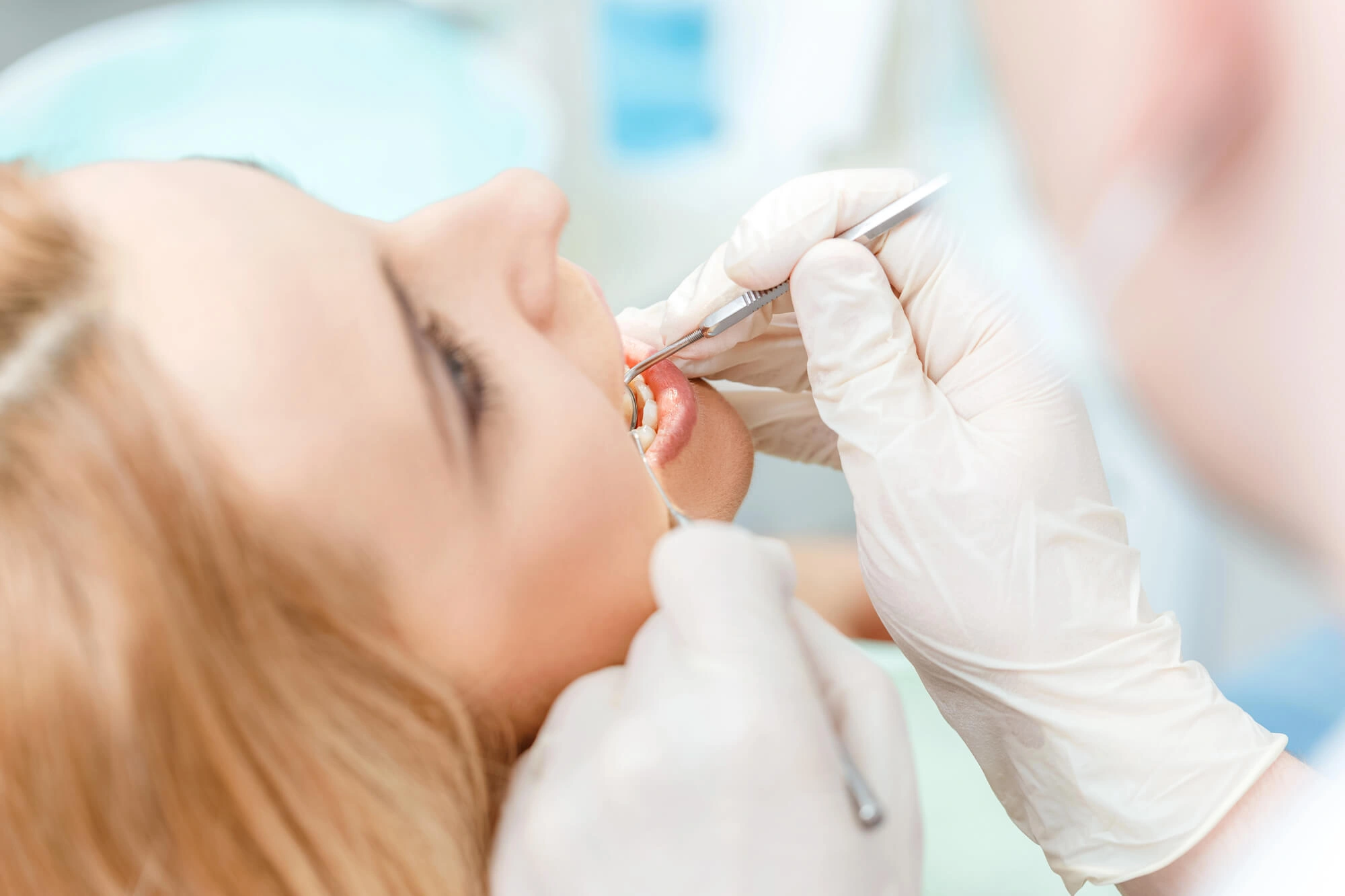 Woman Undergoing gum disease treatment