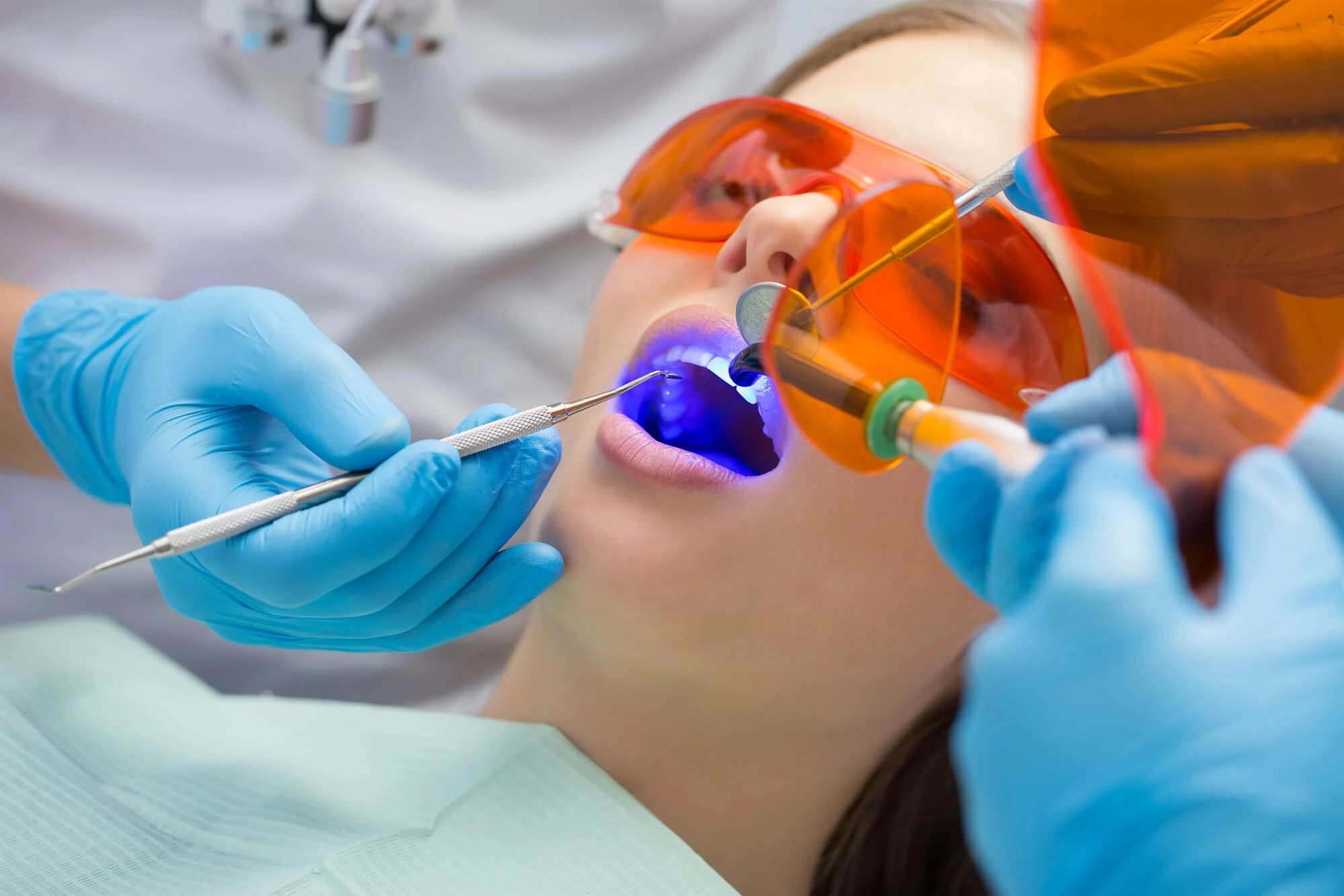 Woman undergoing affordable teeth whitening
