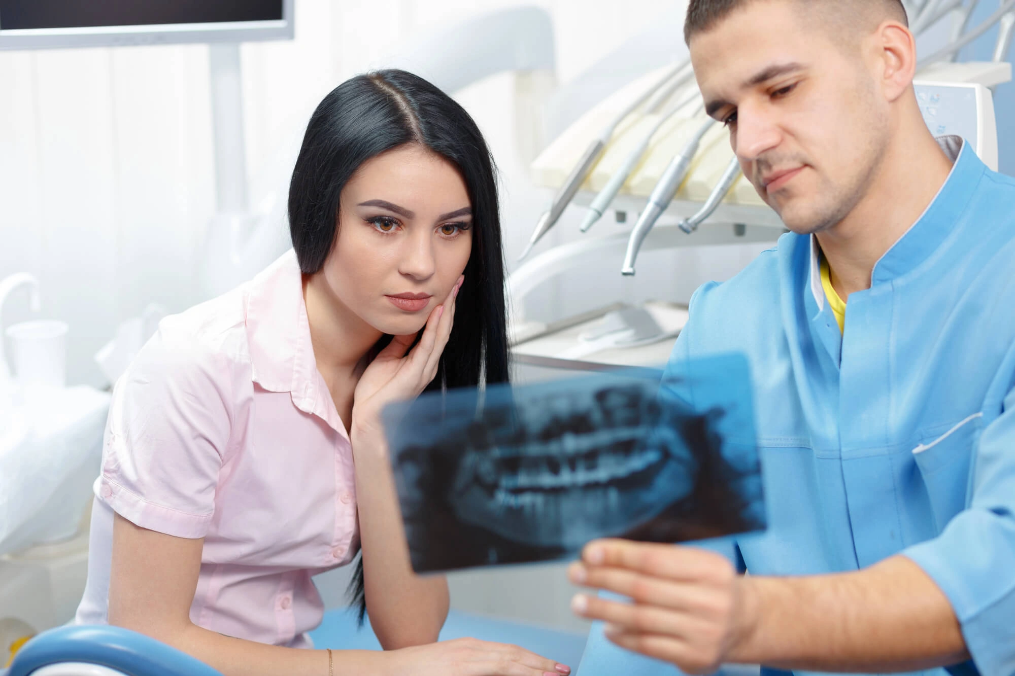 Checking Dental Xray with emergency dentist ft lauderdale