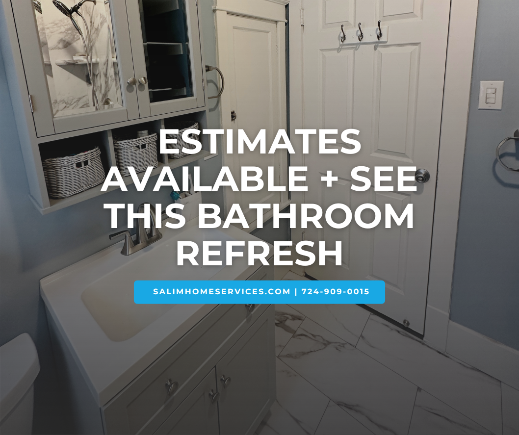 Updated bathroom with new vanity, marble look tub surround, fresh paint, and modern hardware installed by Salim Home Services in Finleyville, PA.