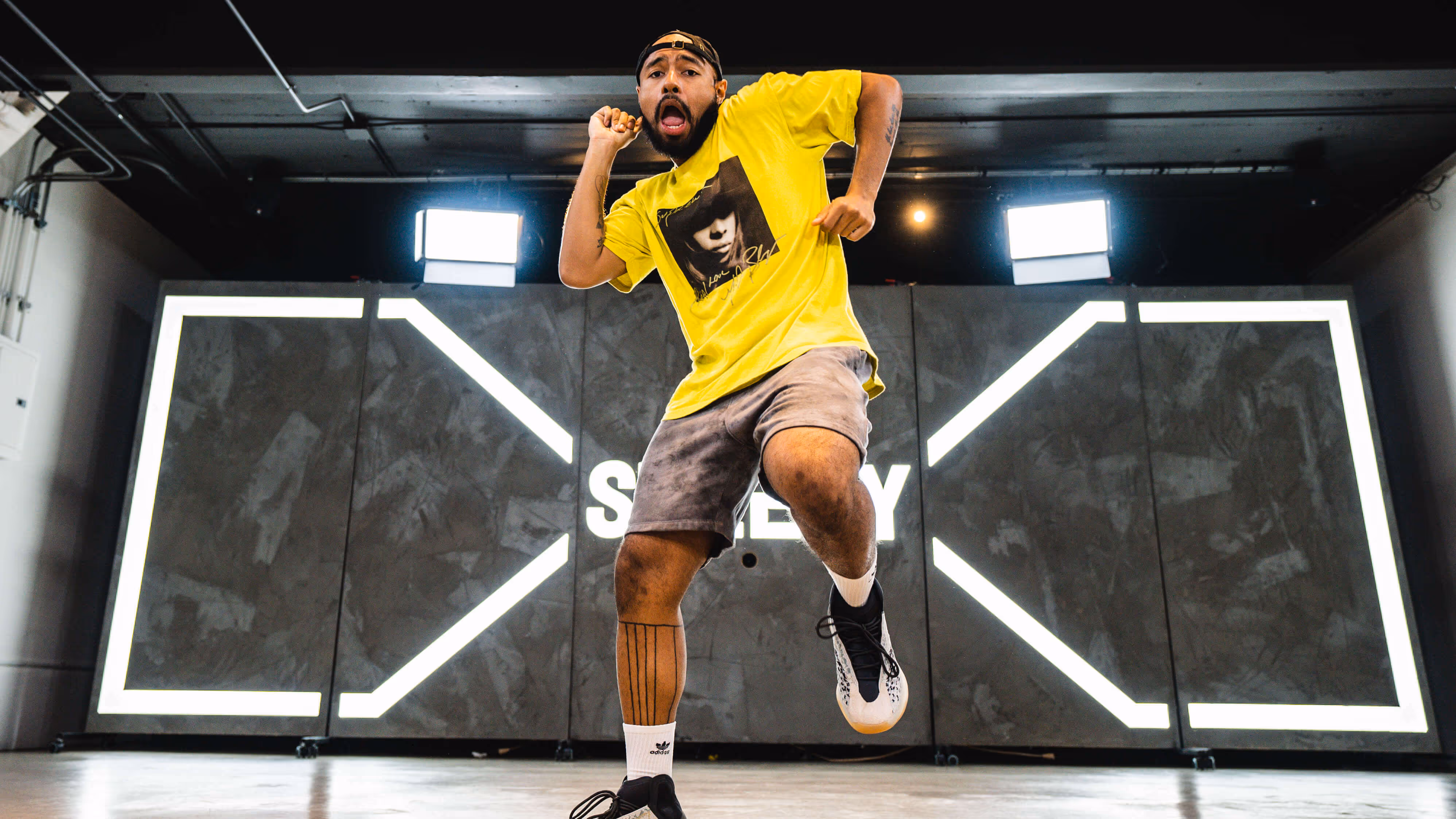 dancer doing the reebok dance move