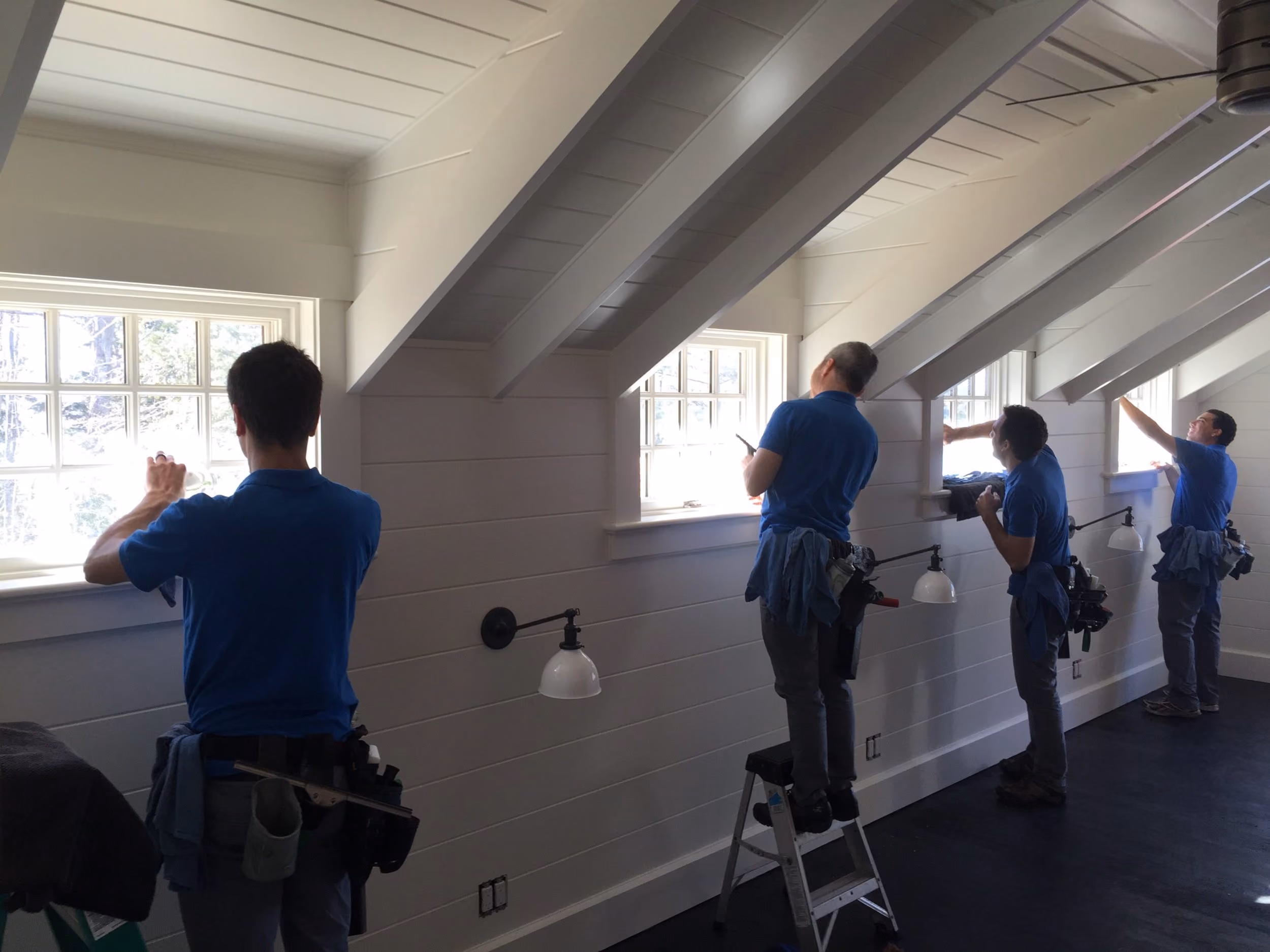 Thru Glass Cleaning Company staff cleaning windows
