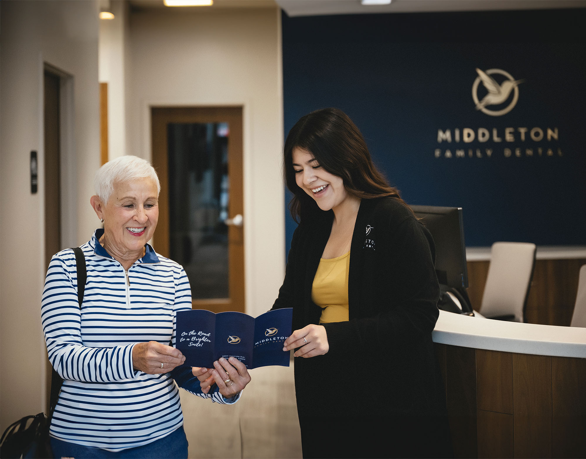 Doctor showing x-ray to patient