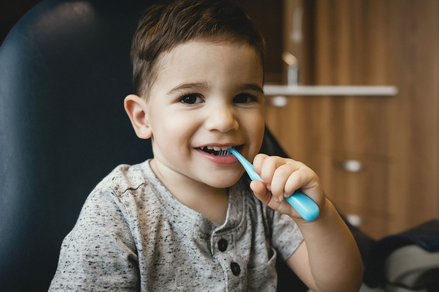 Child holding father's hands