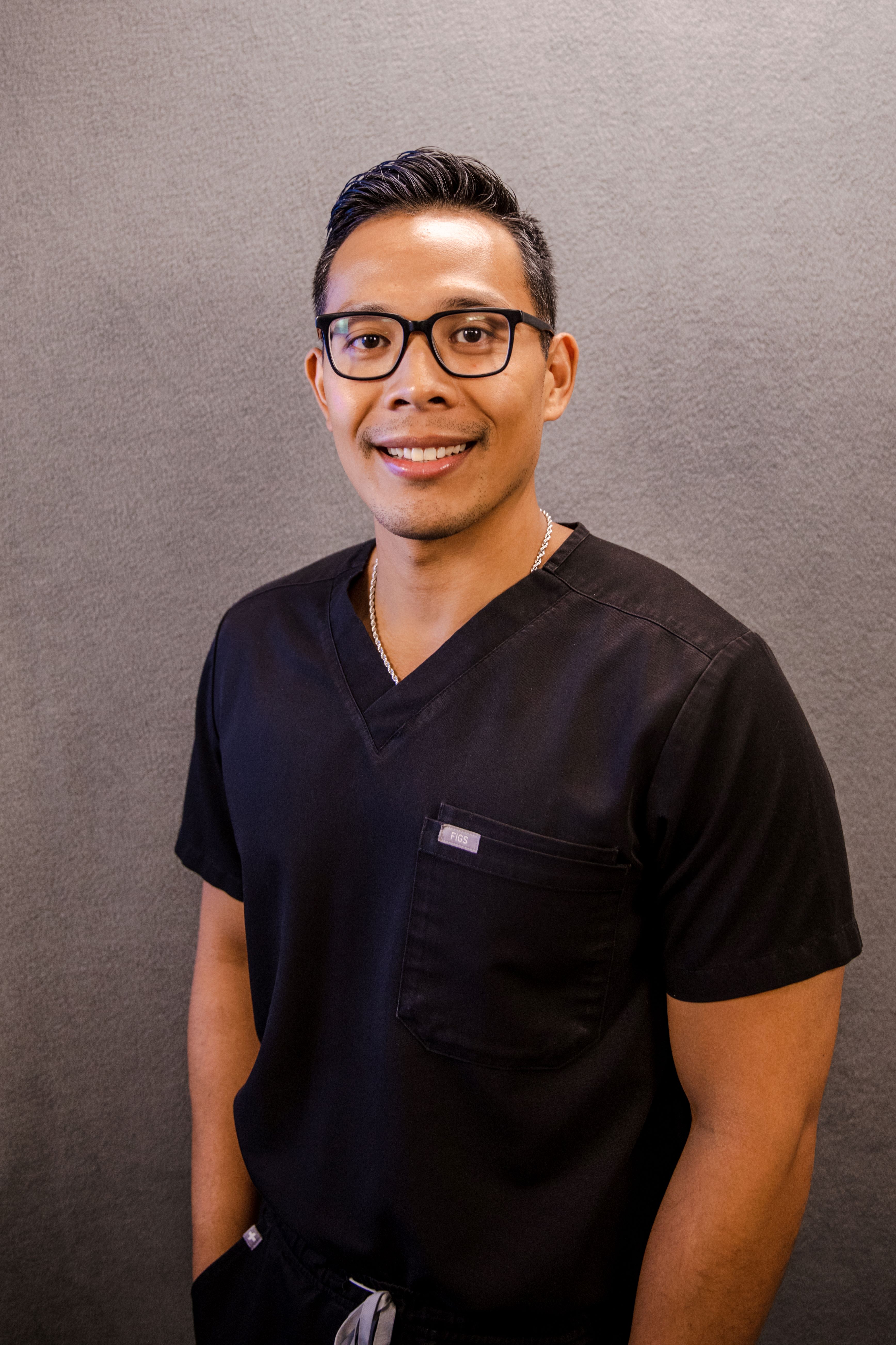 Dr. Jeremy Kamari headshot