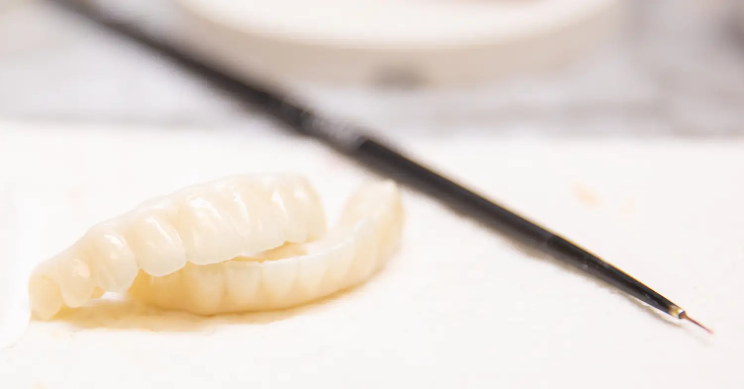 closeup of invisalign and container 