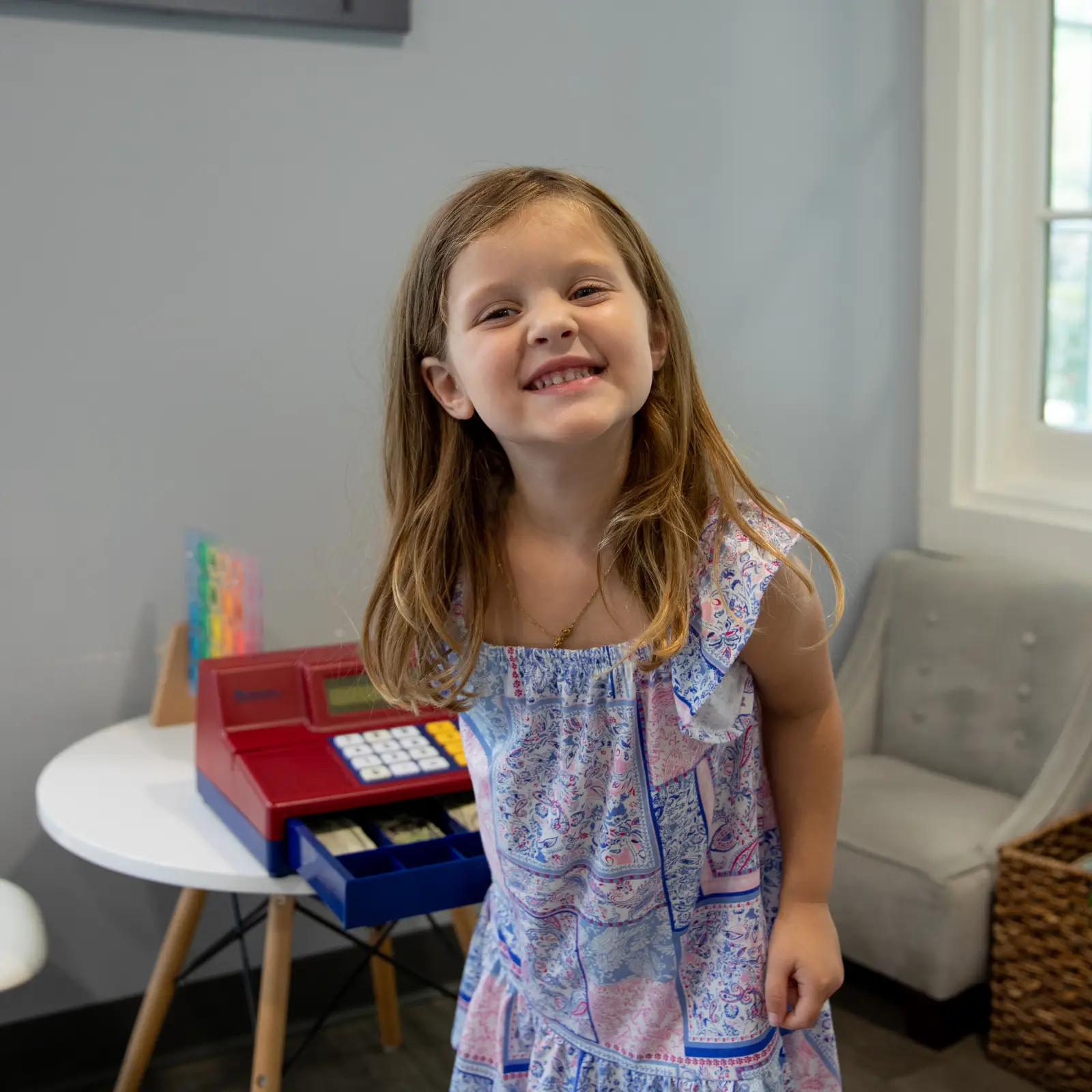 Mother and baby at front desk at Nashoba Valley Dental 