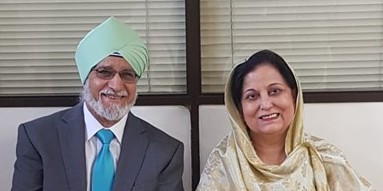 Indian man in a turban, indian wife in a sari