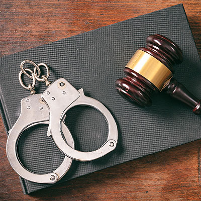 Criminal defense lawyer handcuffs.
