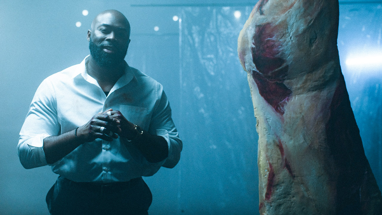 Broadway 10 Tenderizer explaining his job to the audience