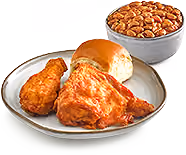2-piece chicken combo: fried chicken, roll, and baked beans.
