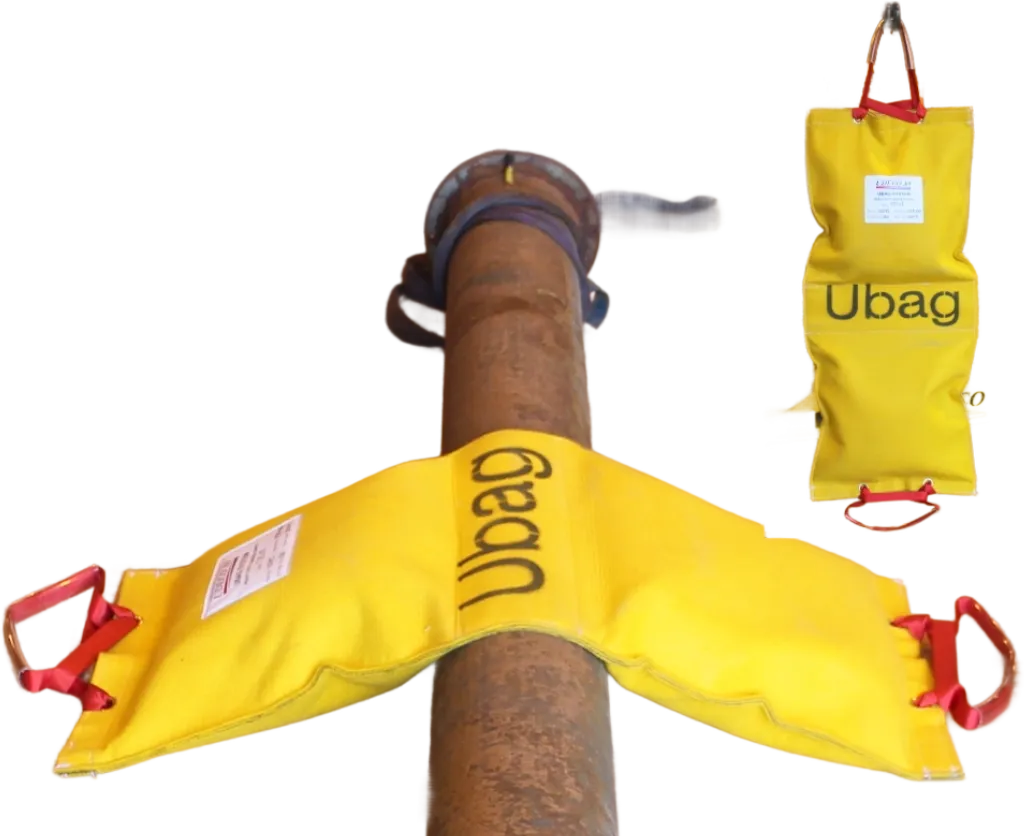 Ubag twin stabilisation bags type T, designed for ROV installation, featuring yellow fabric, webbing straps, and carabiner handles for securing around sea lines.