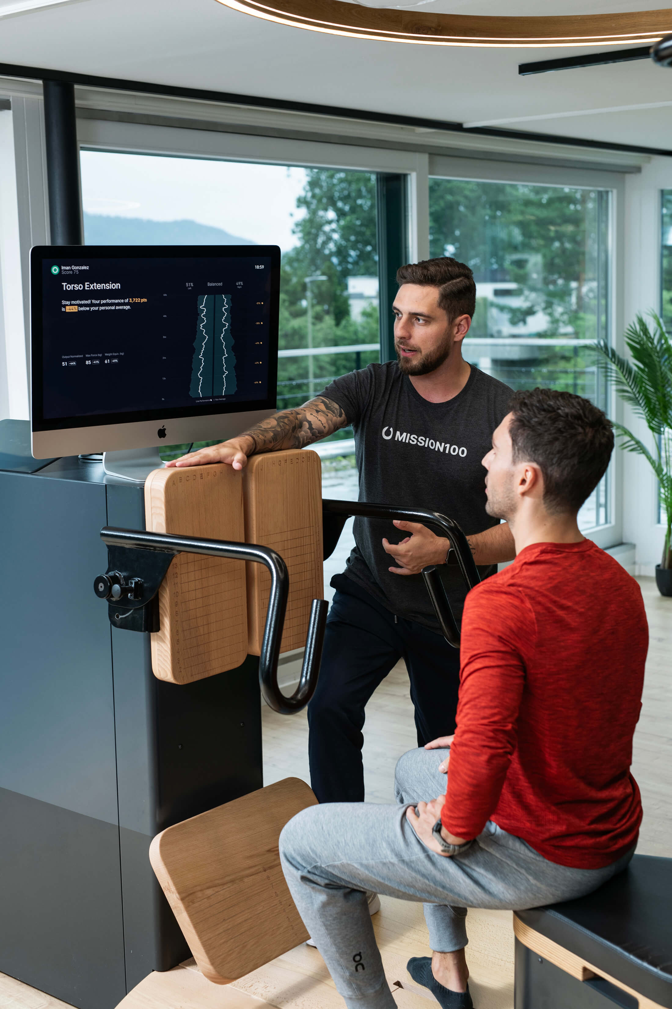 A trainer explains the customer the training results