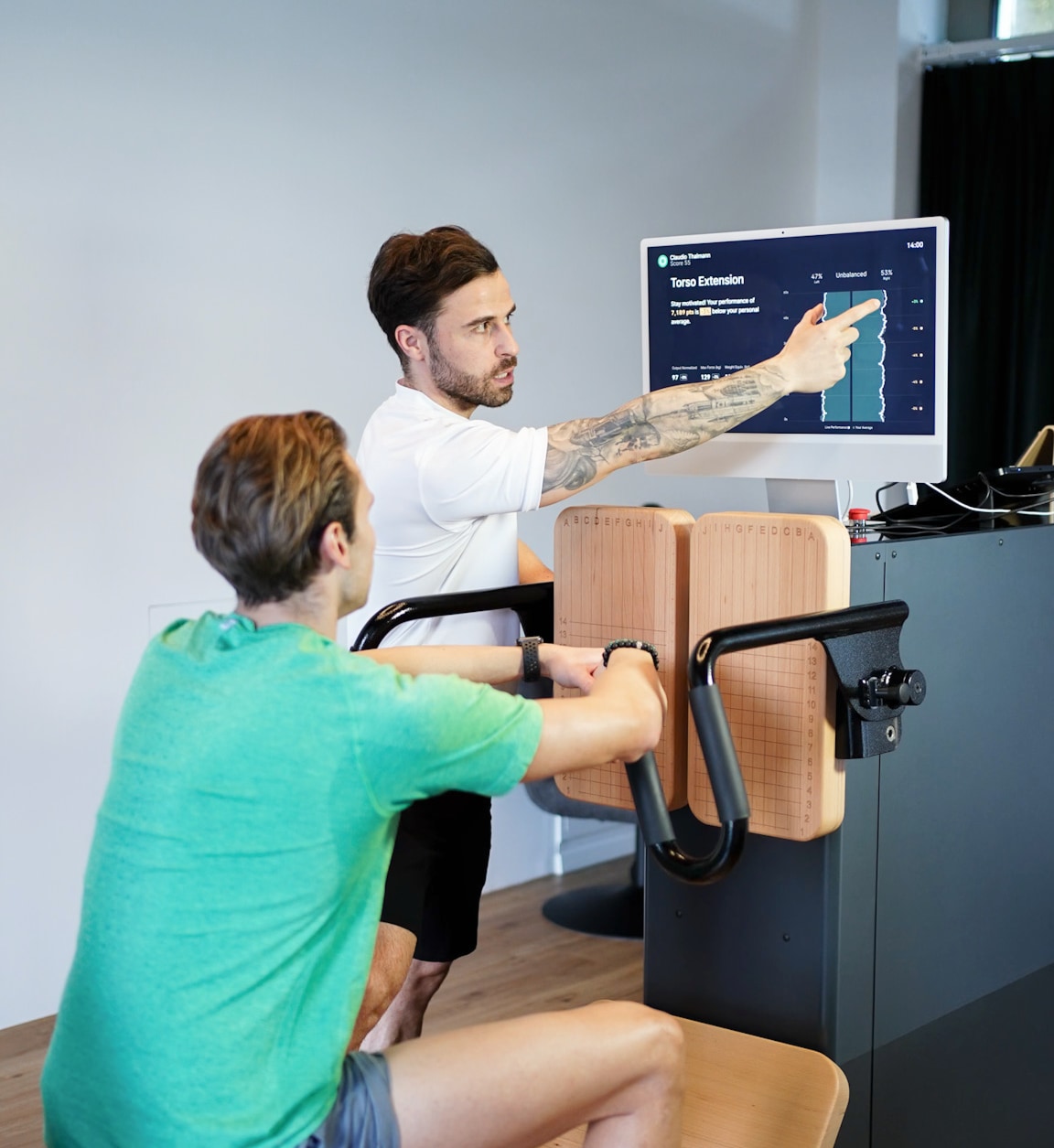 A trainer, explaining the training results for a customer