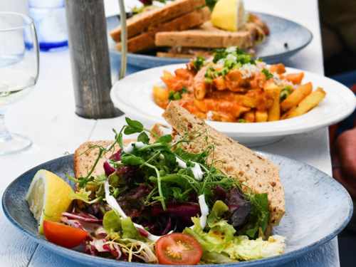 The Crab Shed Salcombe restaurant - waterside seafood dining overlooking the harbour