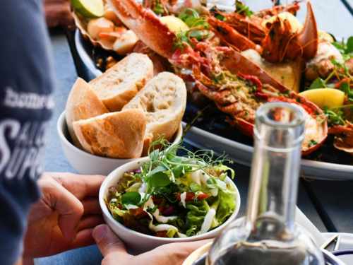 The Crab Shed Salcombe restaurant - waterside seafood dining overlooking the harbour
