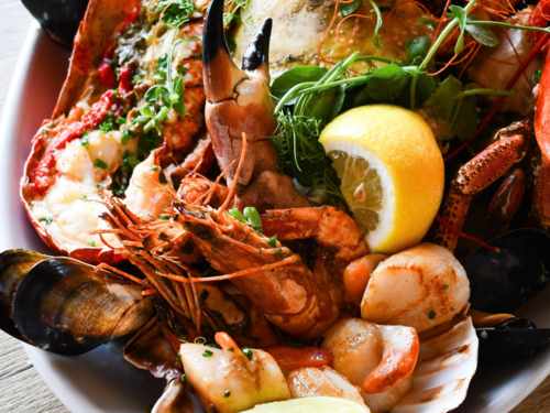 The Crab Shed Salcombe restaurant - waterside seafood dining overlooking the harbour