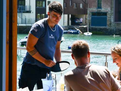 The Crab Shed Salcombe restaurant - waterside seafood dining overlooking the harbour