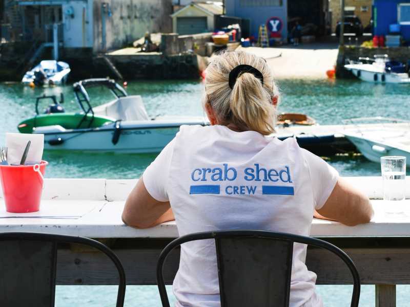 The Crab Shed Salcombe restaurant - waterside seafood dining overlooking the harbour