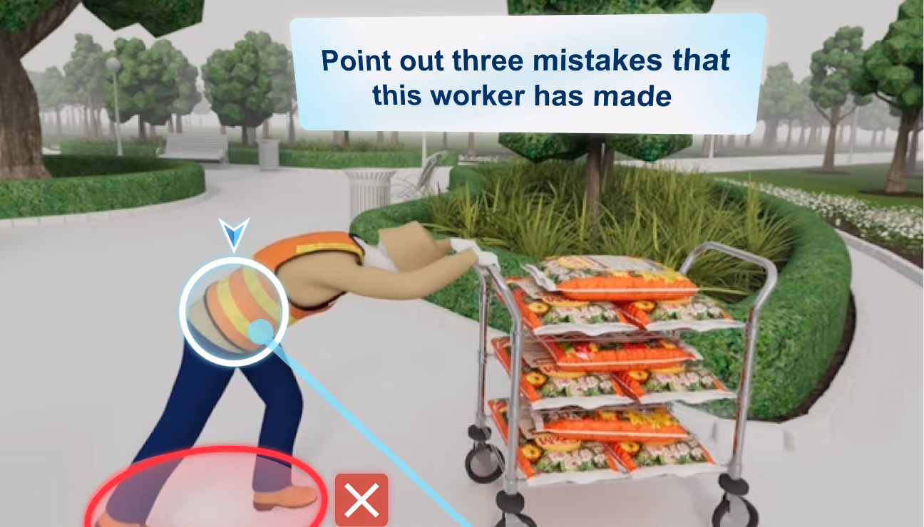 VR safety scenario — "Point out three mistakes that this worker has made" — over a worker bending awkwardly to move a trolley.