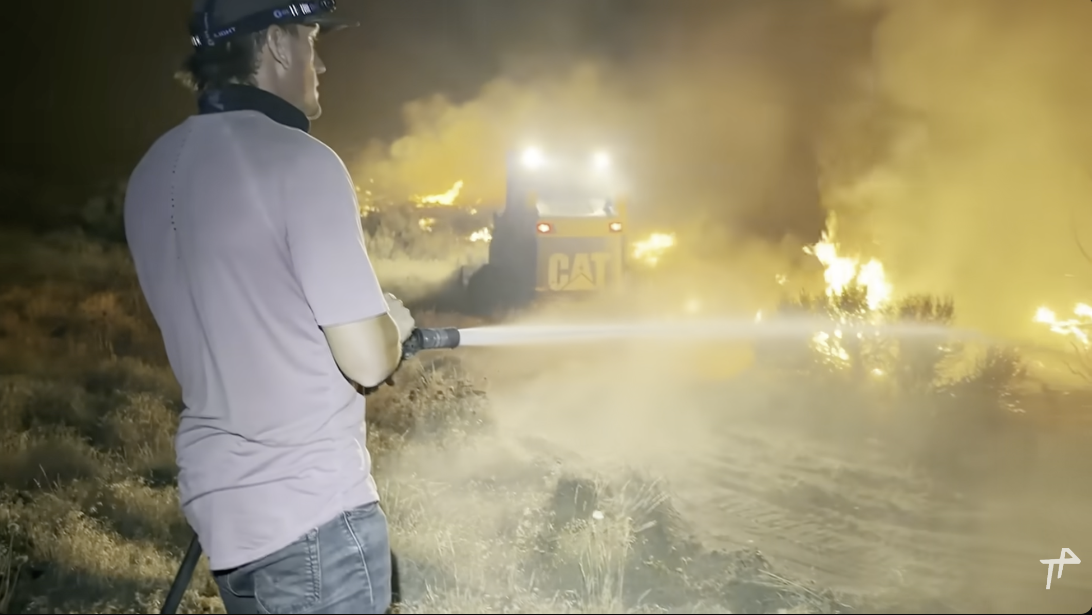 Trent Palmer using QTAC fire skid on property