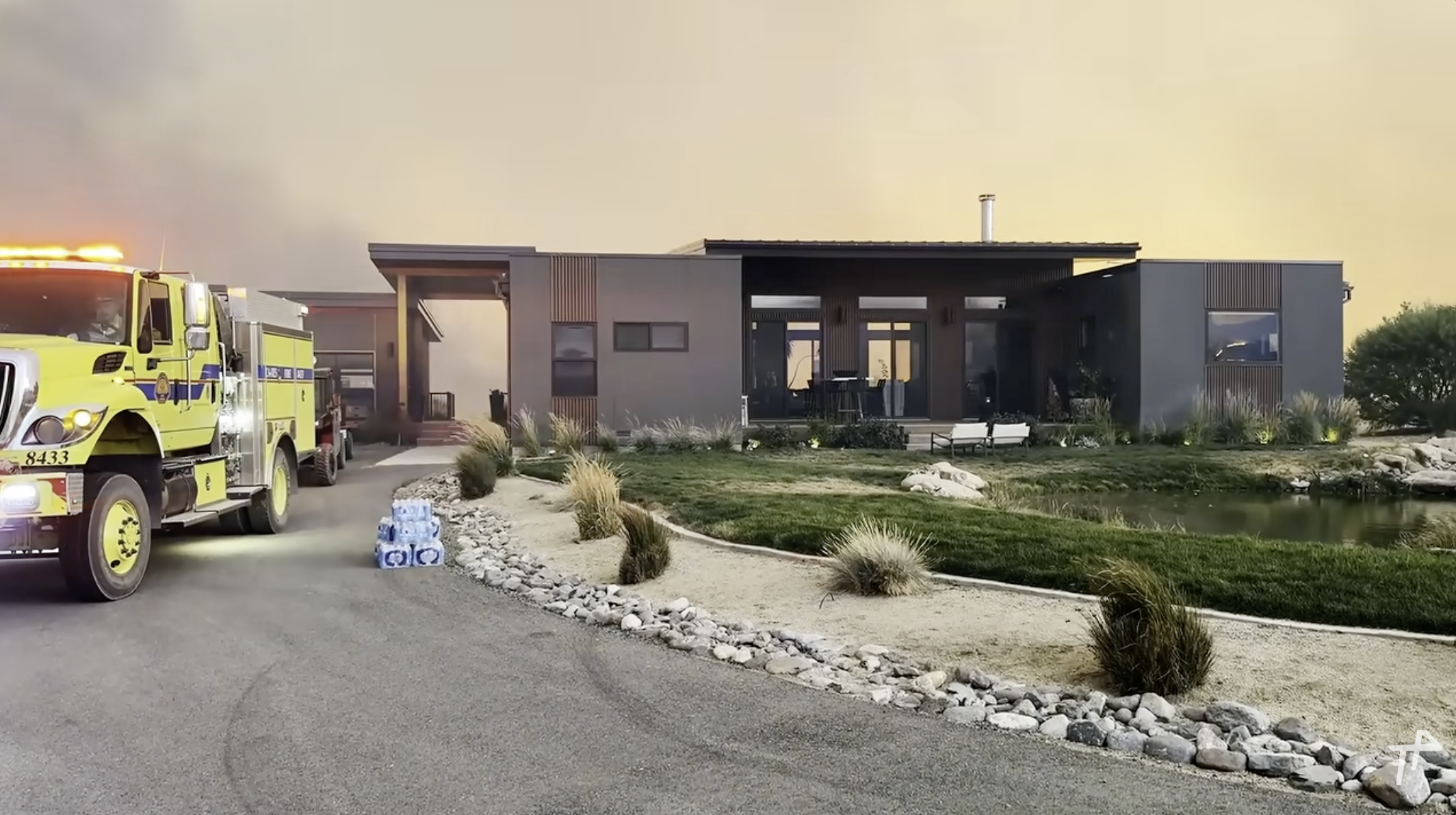 QTAC trailer and skid on property during fire