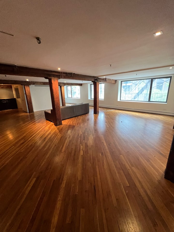 Open loft interior with wood floors at 466 Washington Street in Tribeca, Manhattan, by Gallery KBNY