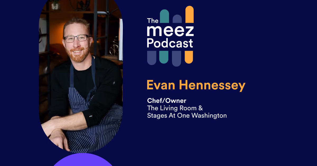 Rectangle image with navy background and photo of Evan Hennessey