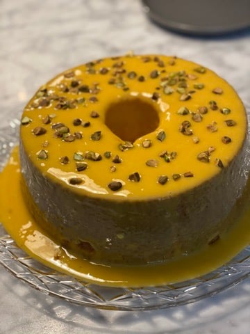 Angel Food cake with passion fruit glaze and pistachios