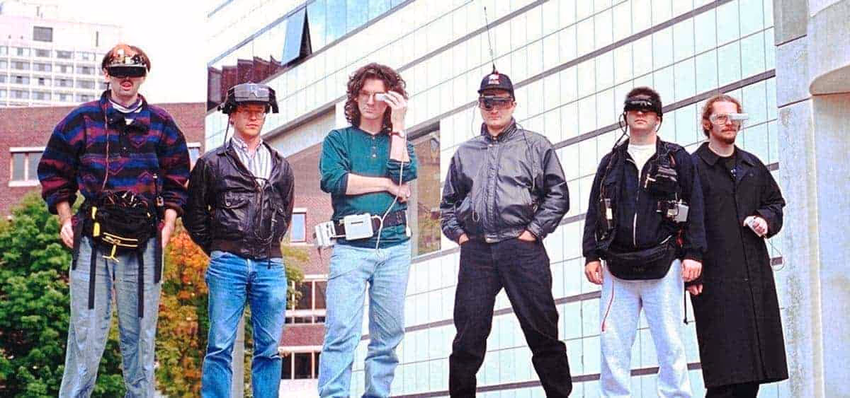 a group of men wearing virtual reality headsets