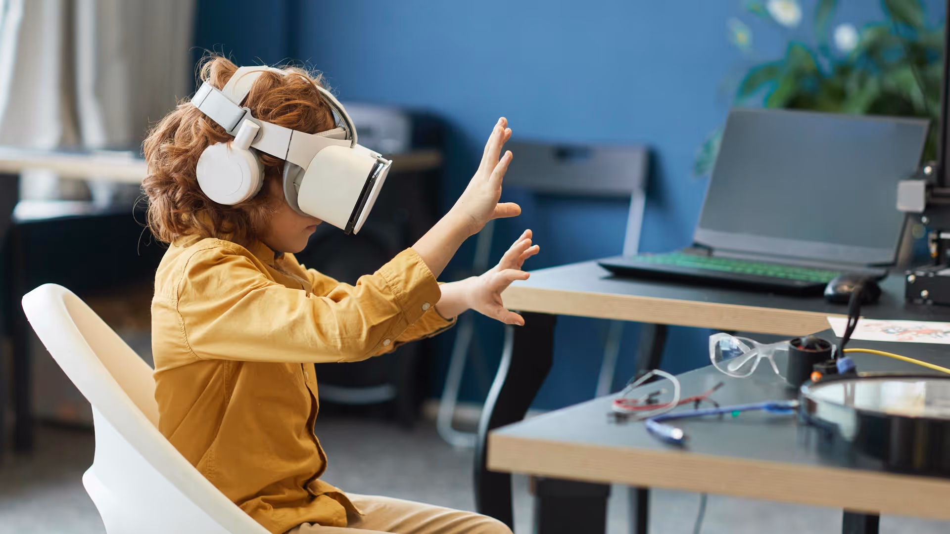 a child wearing a virtual reality headset and a white headphones