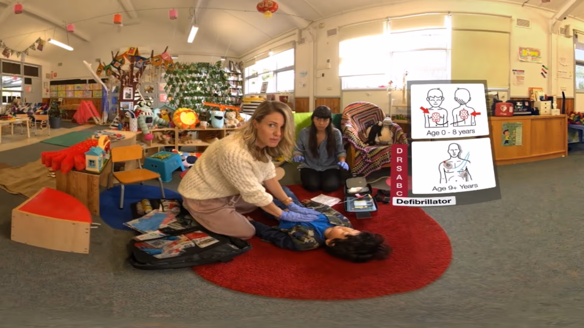 a woman performing cpr on a child's body