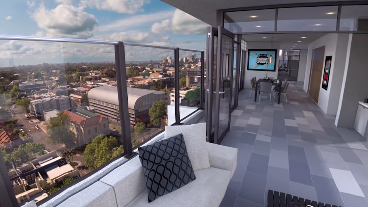 a balcony with a view of a city