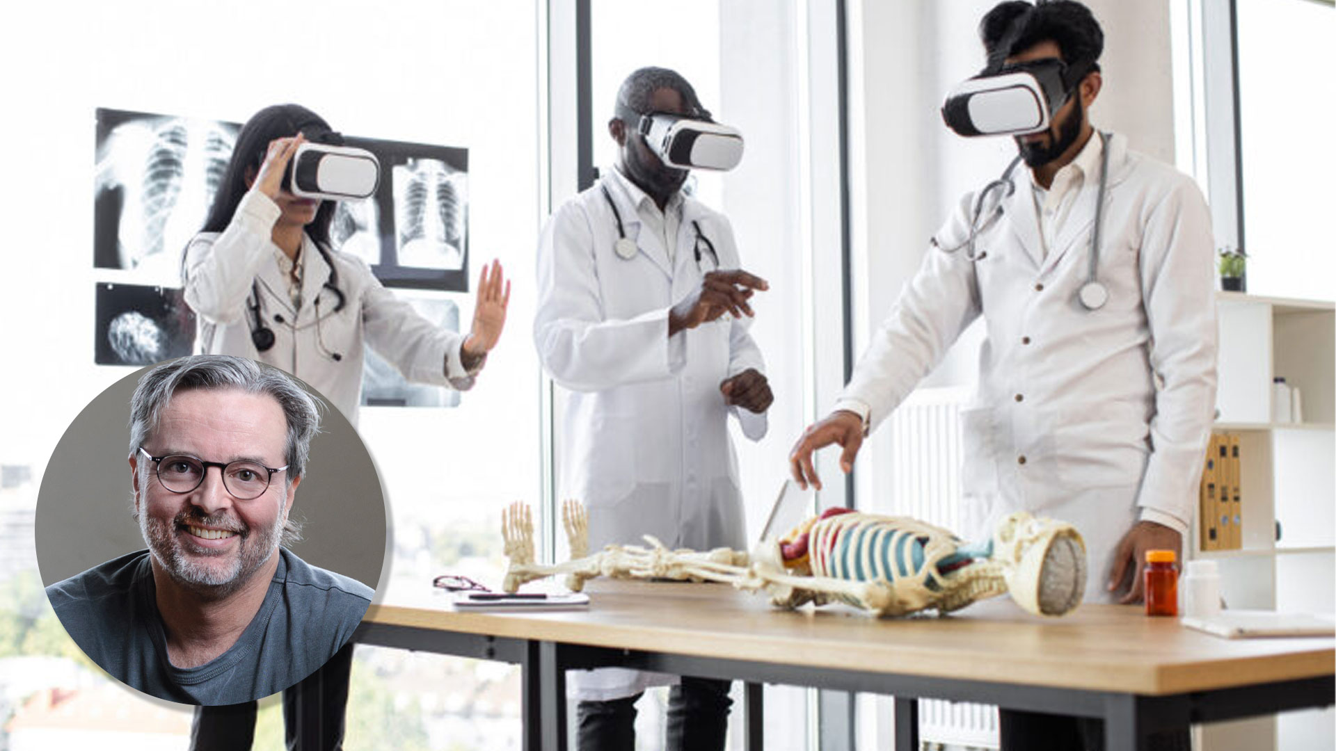 Start Beyond CEO Angus Stevens pictured, with three students in lab coats wearing VR headsets in a training environment