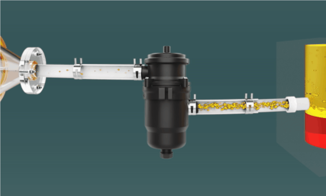 A 3D animated cutaway diagram of a black cylindrical oil filter connected by clear tubes, showing golden particulate debris flowing from a funnel on the left, through the filter housing, into a yellow-and-red canister on the right.