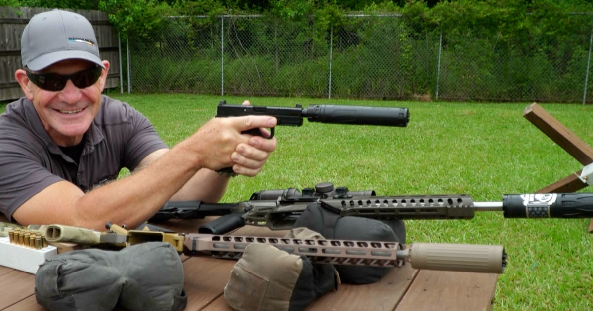 Dead Air Nomad Ti OTB suppressor mounted over-the-barrel on a short .308 AR