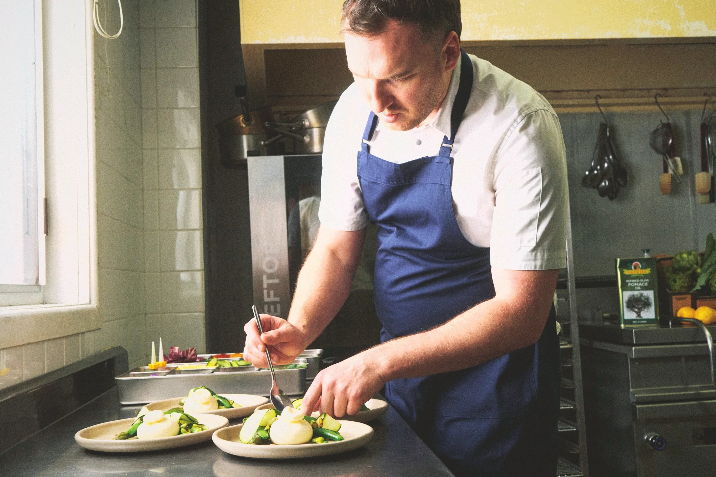 EatFirst chef plating burrata