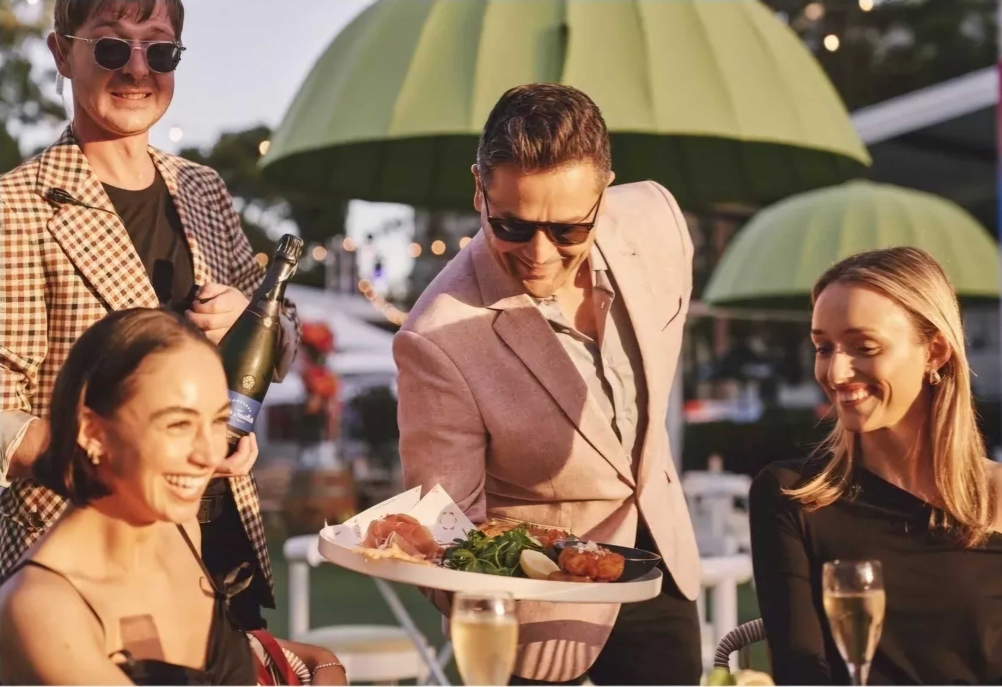 Manny Soultan, National Event Manager, serving guests at an outdoor EatFirst event
