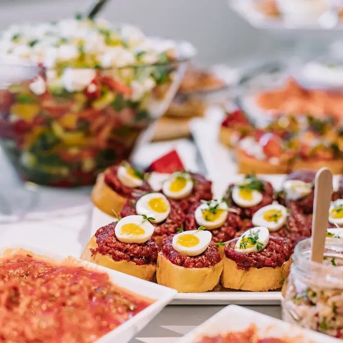 Salads, beef tartar and other catering items.