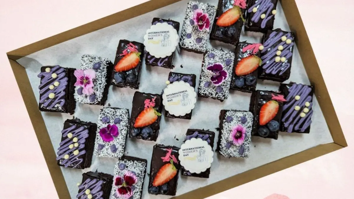 Platter of brownies decorated for International Women's Day from Sevenoaks Catering.