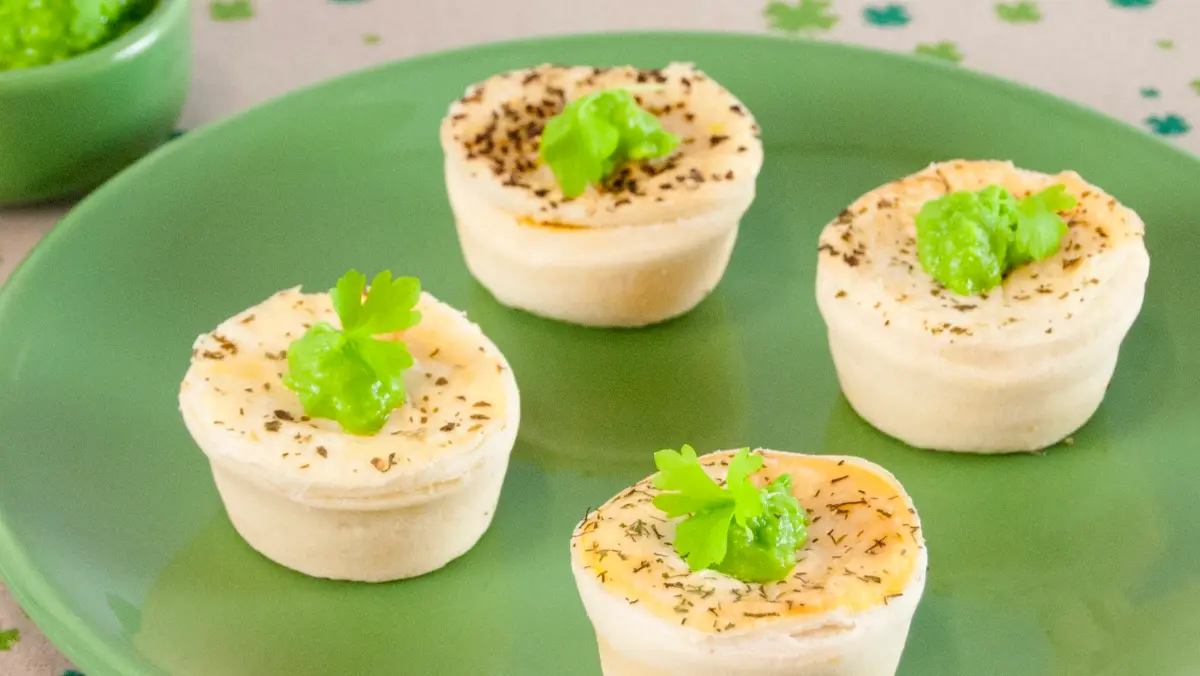 Mini pies with mushy peas.