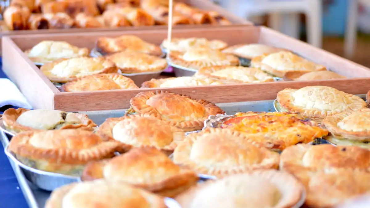 Platters of single-size meat pies.